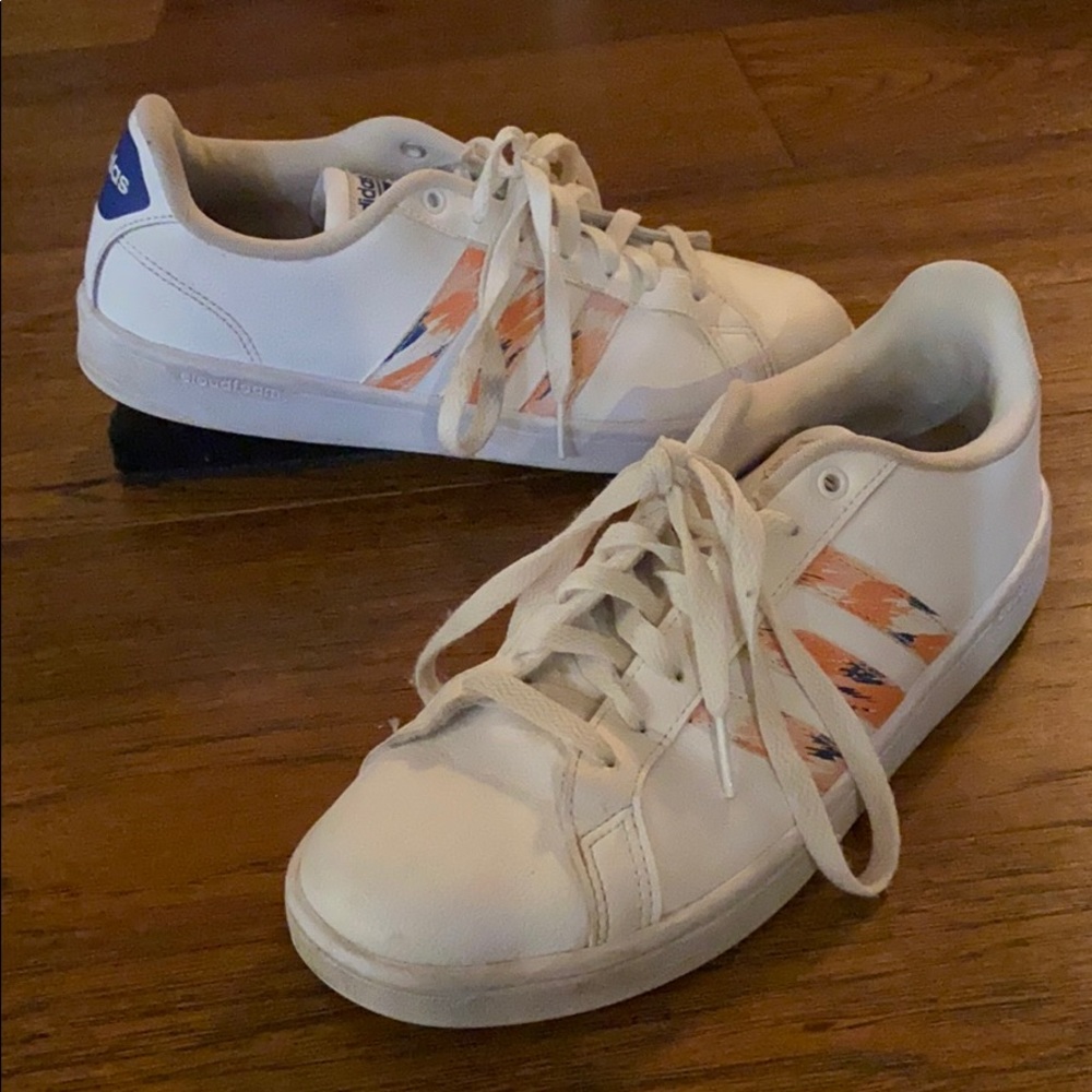 Size 10, women’s adidas sneakers.